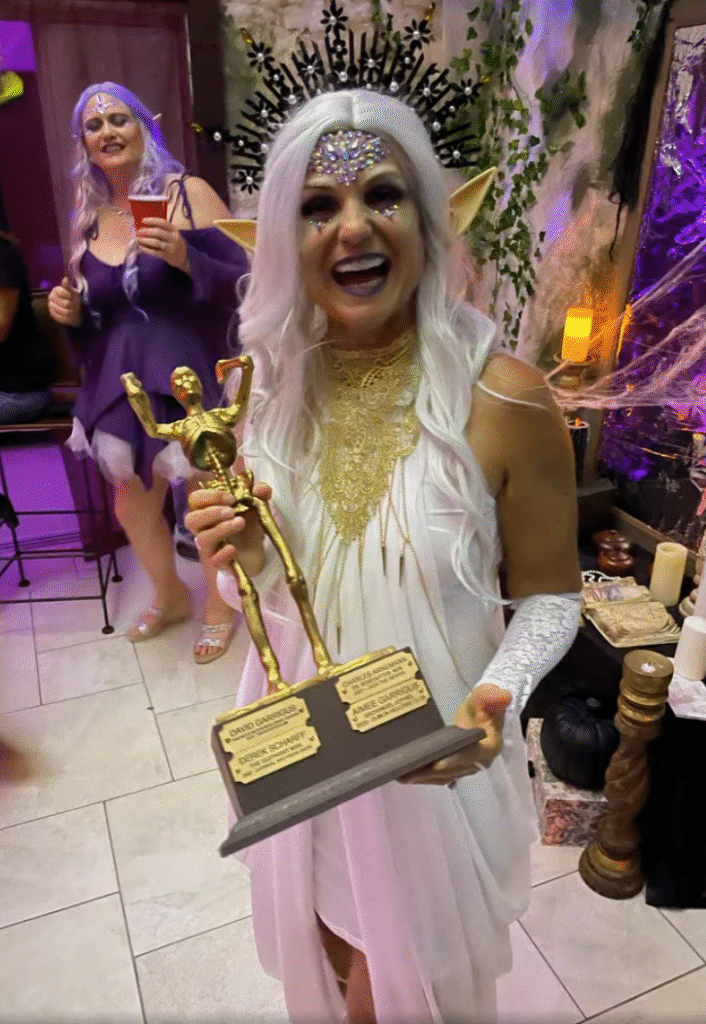 Kim holding The Skelly after winning in 2024