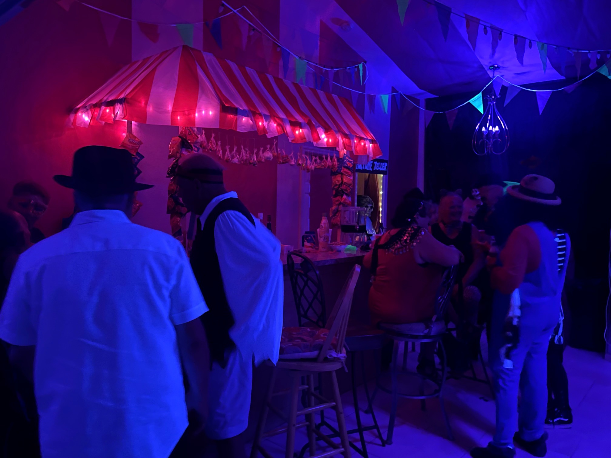 Guests gathered at the carnival concession area during the 2022 party