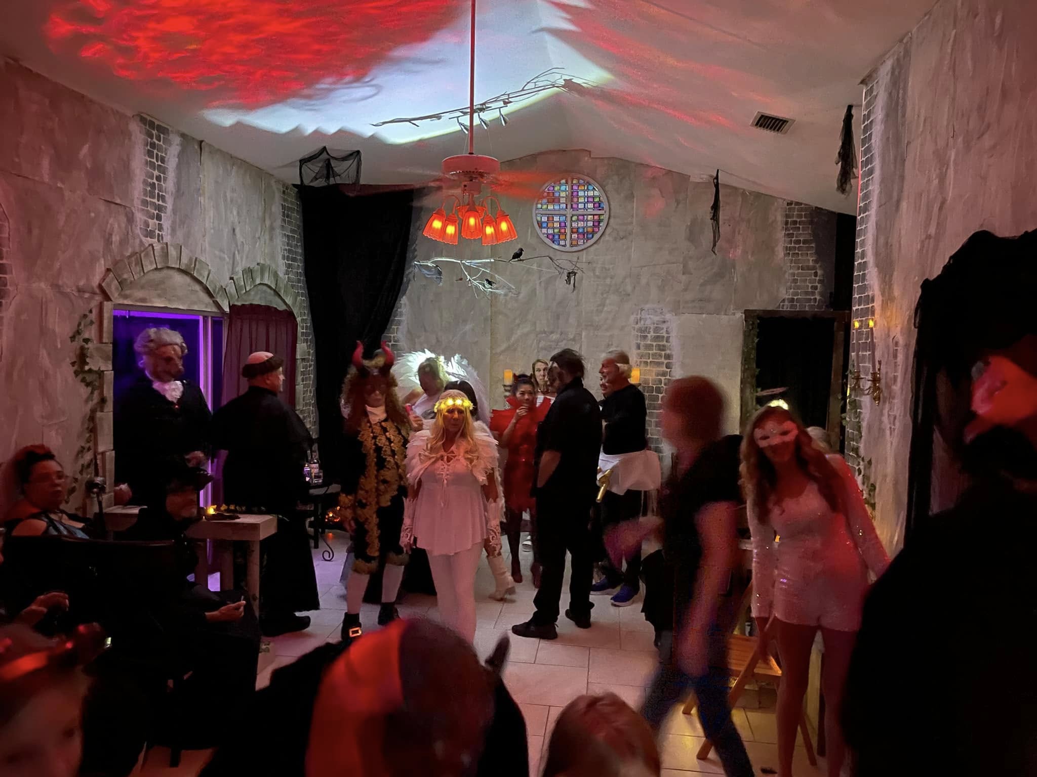 A wide view of guests gathered inside the grand hall during the 2023 party