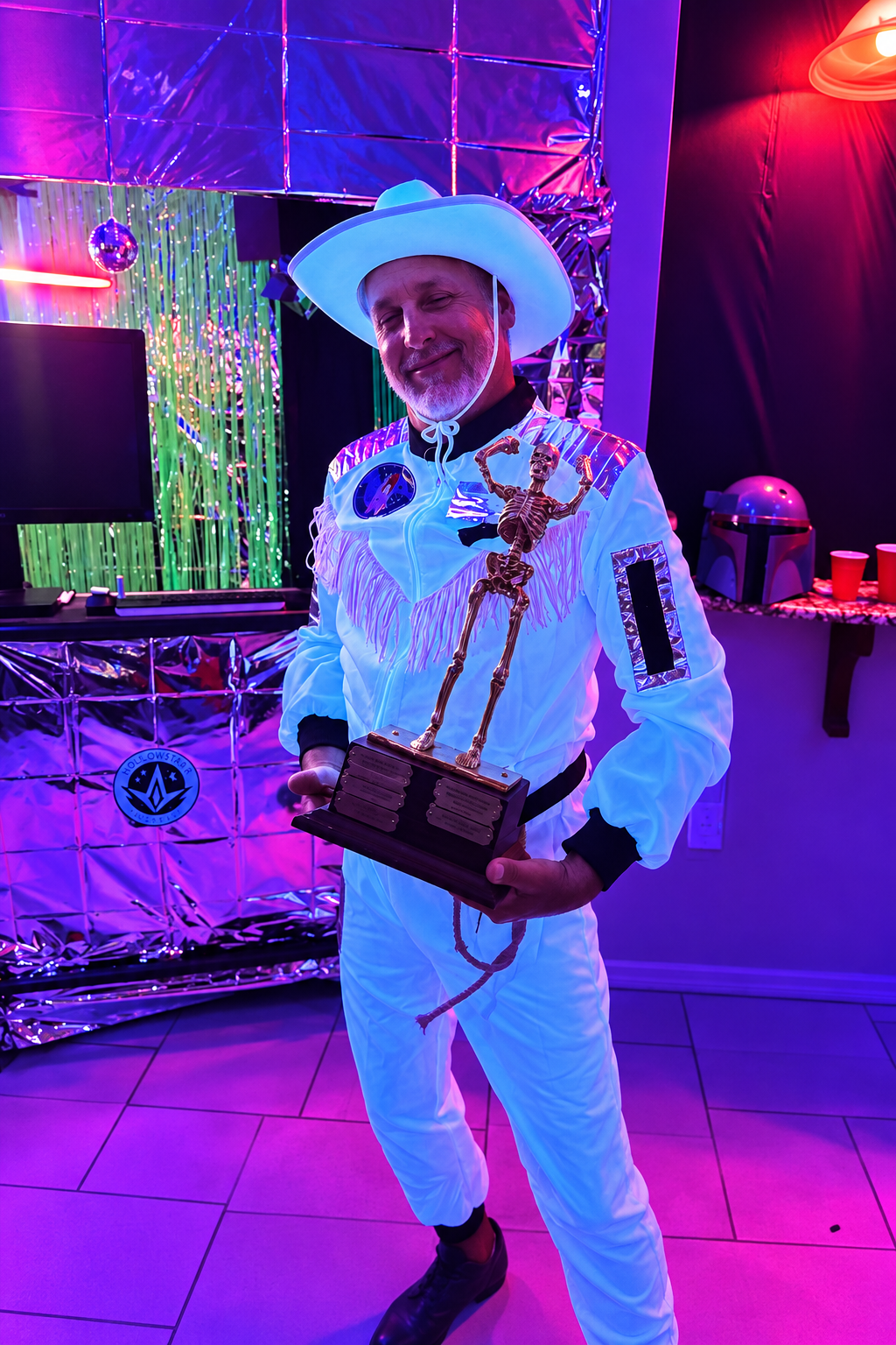Brent W. as Space Cowboy holding The Skelly after winning in 2025